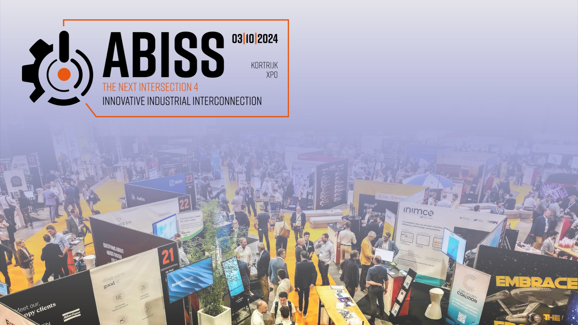 Crowded exhibition hall at the ABISS 2025 event in Kortrijk Xpo, showcasing various industrial technology booths and attendees networking.