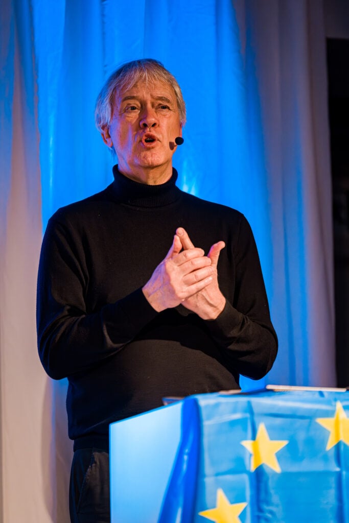 Peter Wennink on stage at Re:Manufacture 2026