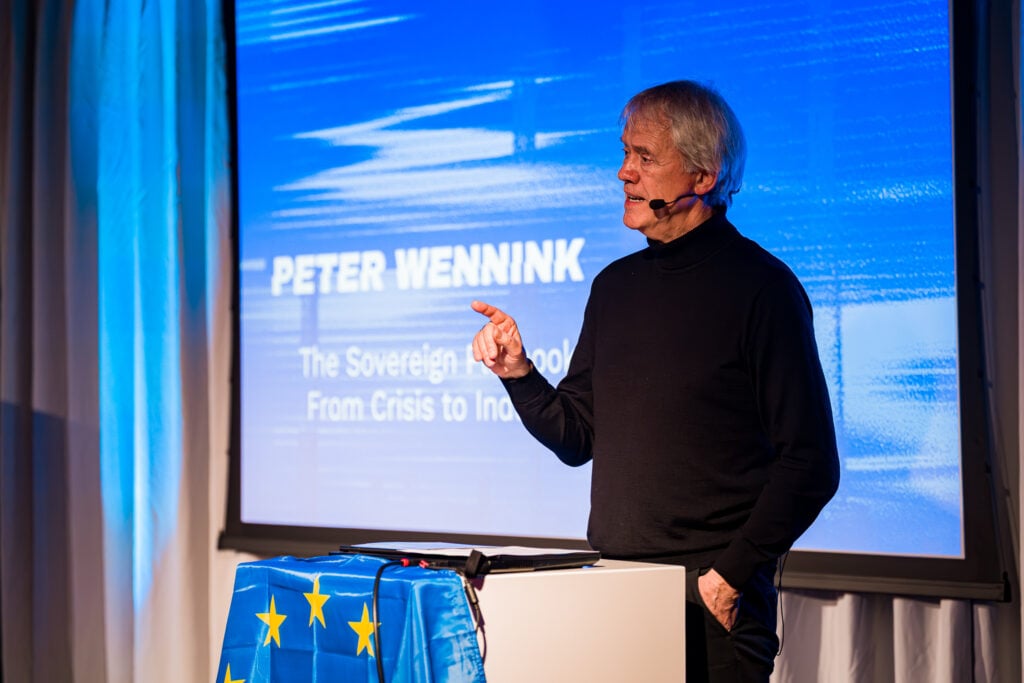 Peter Wennink on stage at Re:Manufacture 2026