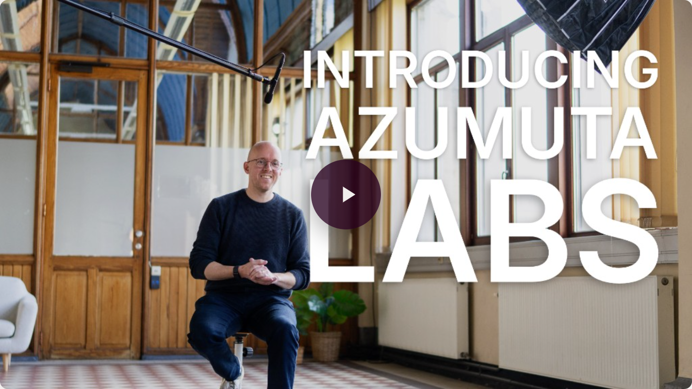 Thumbnail of the “Introducing Azumuta Labs” video: a person seated in a bright industrial space with the title overlaid.